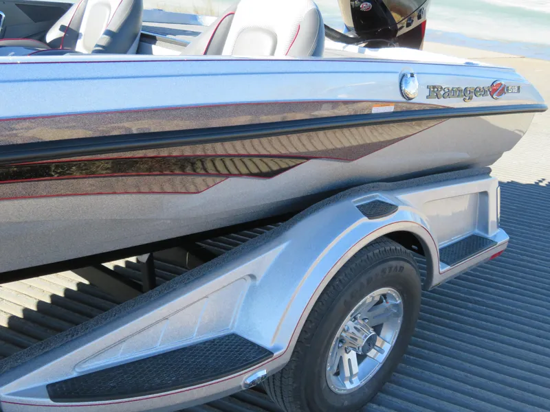 Slide: The Image of 2024 Ranger Z518 Ranger Cup Equipped boat on trailer, side view. - 2
