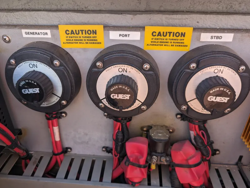Slide: The Image of Battery switches on a 1995 Sea Ray 380 Sun Sport boat. - 16