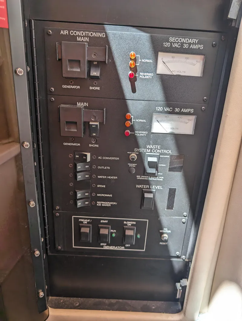 Slide: The Image of Control panel of a 1995 Sea Ray 380 Sun Sport boat. - 17