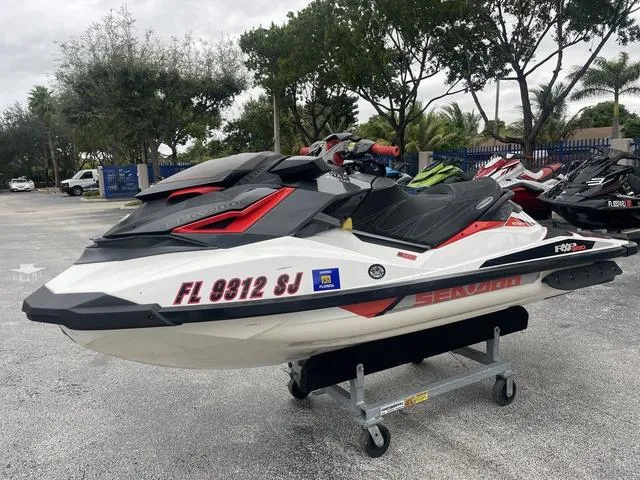 Slide: The Image of 2016 Sea-Doo Waverunner RXP on display, parked outdoors on a stand. - 14
