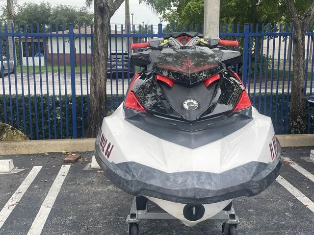 Slide: The Image of 2016 Sea-Doo Waverunner RXP parked on a stand in a lot. - 5