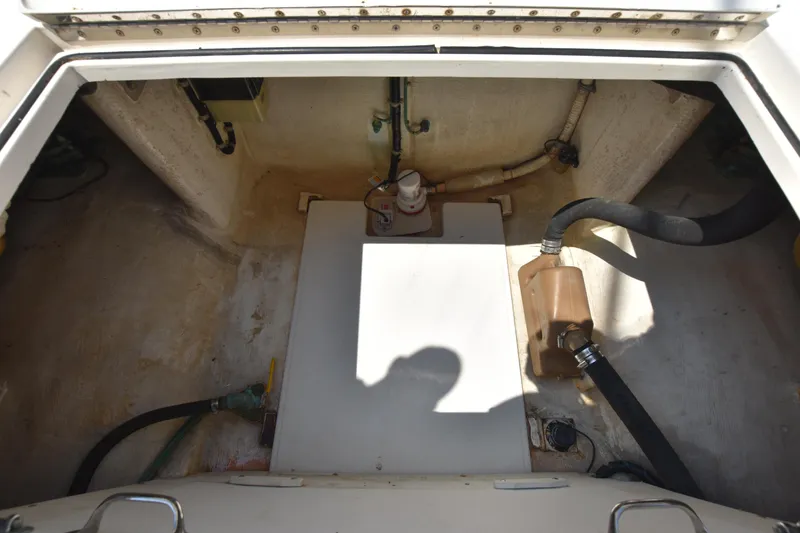 Slide: The Image of Engine compartment of a 1994 Cabo 35 Flybridge Sportfisher boat. - 29