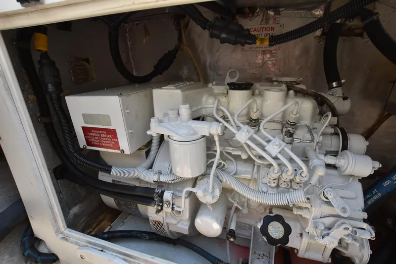 Slide: The Image of Engine compartment of a 1994 Cabo 35 Flybridge Sportfisher boat. - 30