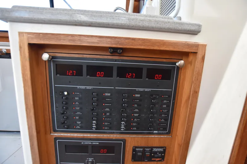 Slide: The Image of Electrical control panel on a 1994 Cabo 35 Flybridge Sportfisher boat. - 39
