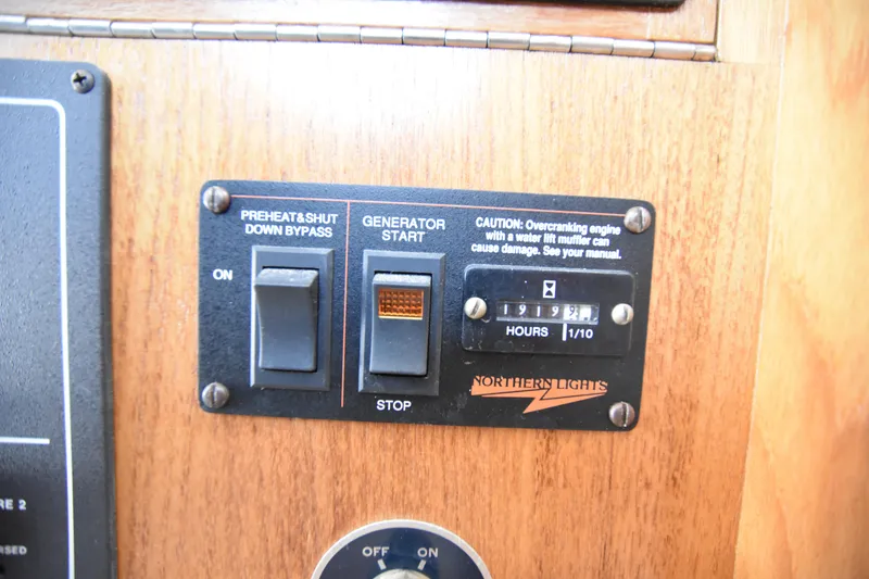 Slide: The Image of Control panel of a 1994 Cabo 35 Flybridge Sportfisher boat. - 41