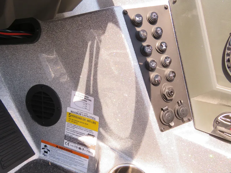 Slide: The Image of Control panel of 2024 Ranger Z519 Ranger Cup Equipped boat with capacity label. - 12