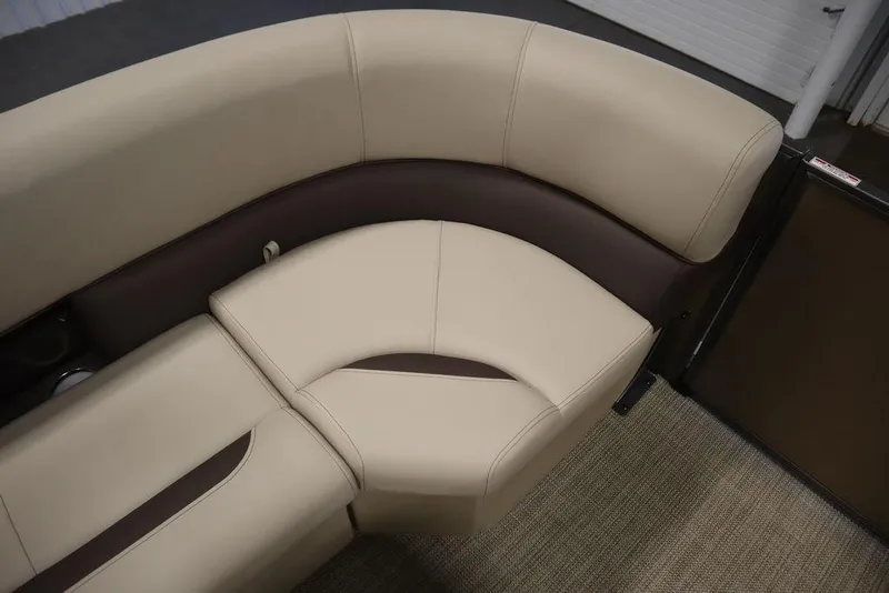 Slide: The Image of 2025 Bentley Pontoons 223 QSB Tri-Toon interior seating, beige and brown upholstery. - 20