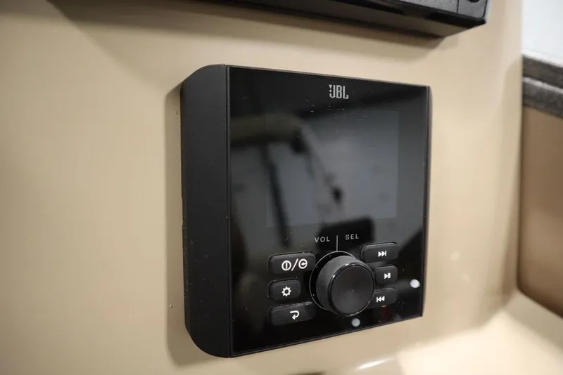 Slide: The Image of JBL audio control panel on 2025 Bentley Pontoons 223 QSB Tri-Toon. - 32