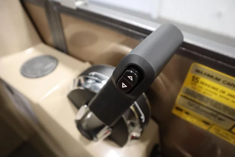 Slide: The Image of Close-up of 2025 Bentley Pontoons 223 QSB Tri-Toon throttle control. - 33