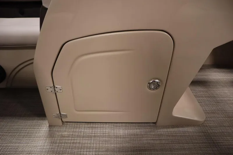 Slide: The Image of 2025 Bentley Pontoons 223 QSB Tri-Toon storage compartment with beige finish. - 35