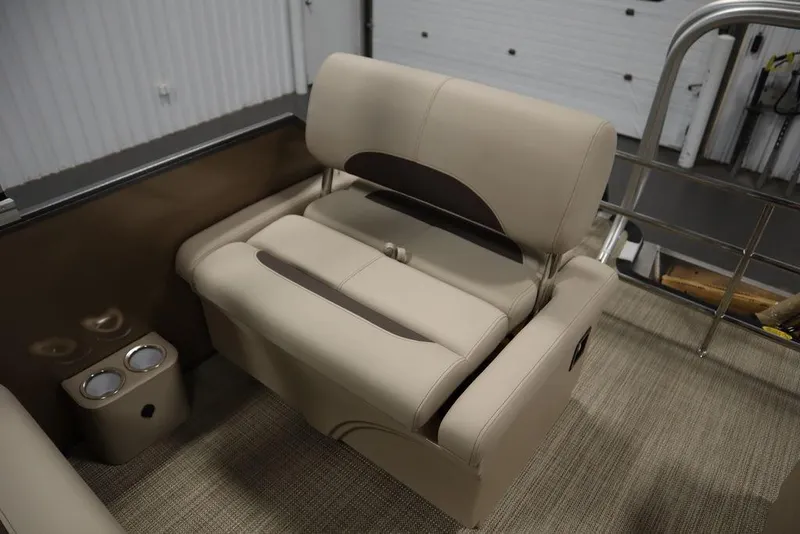 Slide: The Image of 2025 Bentley Pontoons 223 QSB Tri-Toon interior seating with cup holders. - 40