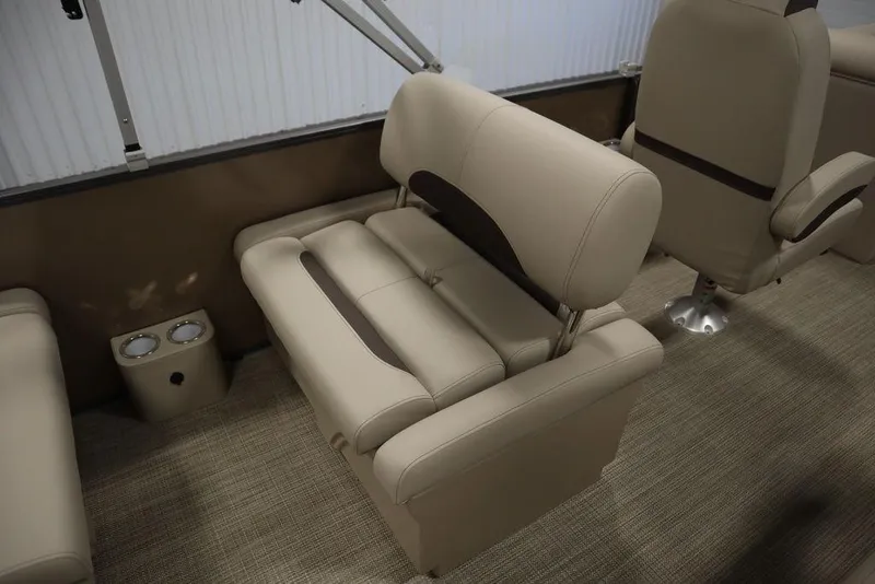 Slide: The Image of 2025 Bentley Pontoons 223 QSB Tri-Toon interior seating with beige upholstery. - 42