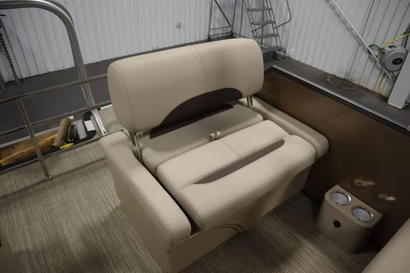 Slide: The Image of 2025 Bentley Pontoons 223 QSB Tri-Toon interior seating with cup holders. - 44