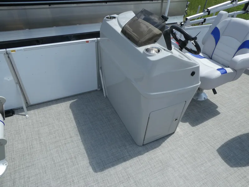 Slide: The Image of 2023 SunCatcher Select 20FC boat console and captain's chair. - 6