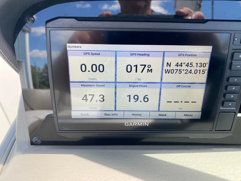Slide: The Image of Garmin GPS display on 2023 Crownline 280 XSS showing speed, heading, and position. - 18