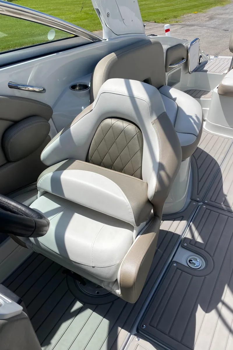 Slide: The Image of 2023 Crownline 280 XSS boat interior with luxurious seating and modern design. - 33