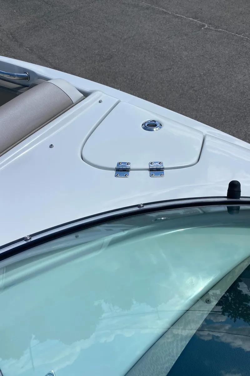 Slide: The Image of 2023 Crownline 280 XSS boat deck with sleek design and chrome fittings. - 40