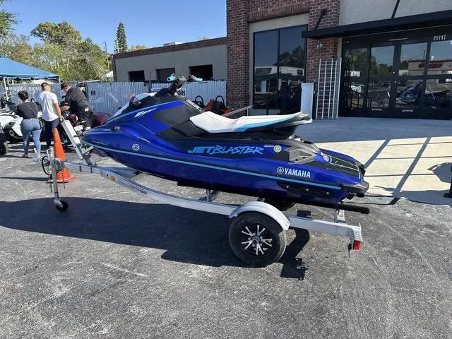Slide: The Image of 2024 Yamaha Marine Waverunner Jet Blaster in racing blue, rear view with handlebars and speakers. - 6