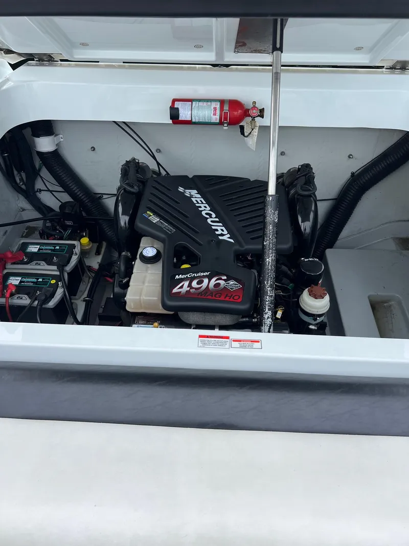 Slide: The Image of 2007 Baja Outlaw 260 engine compartment with Mercury 496 MAG engine. - 10