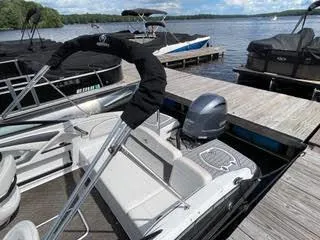 Slide: The Image of 2017 Monterey 197 BR Blackfin boat docked at a marina on a sunny day. - 12