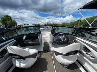 Slide: The Image of Interior of a 2017 Monterey 197 BR Blackfin boat with white seating. - 28