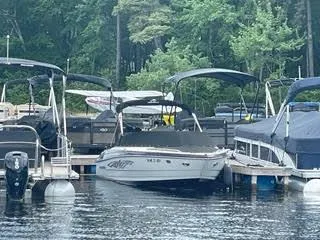 Slide: The Image of 2017 Monterey 197 BR Blackfin boat docked at a marina surrounded by other boats. - 3
