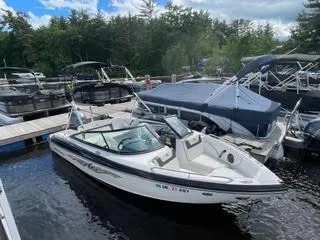 Slide: The Image of 2017 Monterey 197 BR Blackfin boat docked at a marina with other boats. - 30