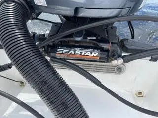 Slide: The Image of Close-up of SeaStar hydraulic steering system on 2017 Monterey 197 BR Blackfin boat. - 33