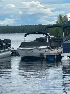 Slide: The Image of 2017 Monterey 197 BR Blackfin boat docked on a serene lake. - 39