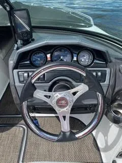 Slide: The Image of Steering wheel and dashboard of a 2017 Monterey 197 BR Blackfin boat. - 8