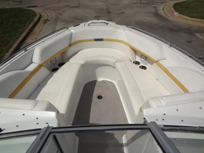 Slide: The Image of 2007 Formula 240 BR boat with spacious white seating area. - 25