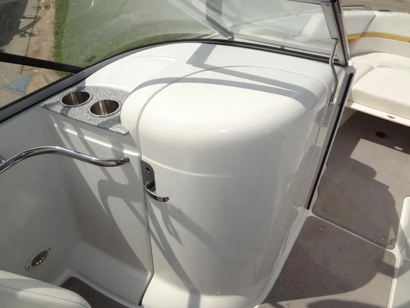 Slide: The Image of 2007 Formula 240 BR boat interior with cup holders and seating area. - 30