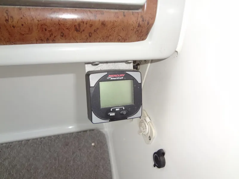 Slide: The Image of Mercury SmartCraft gauge on 2007 Formula 240 BR boat dashboard. - 37