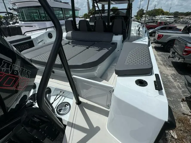 Slide: The Image of 2024 BRABUS Shadow 1000 ST luxury boat interior with seating and sleek design. - 4