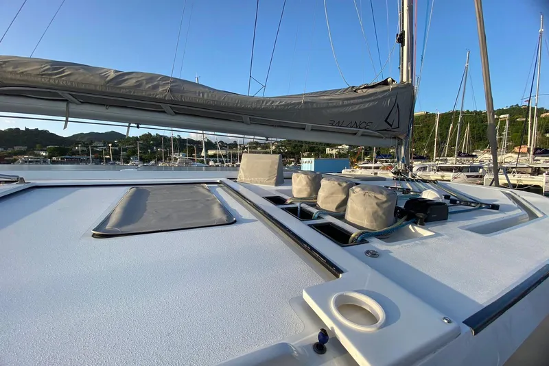 Slide: The Image of Sailboat Balance 442, 2022 model, docked at marina with clear blue sky. - 123