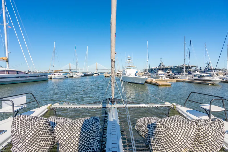 Slide: The Image of View from Balance 442 catamaran in marina, 2022 model, with clear blue sky. - 18