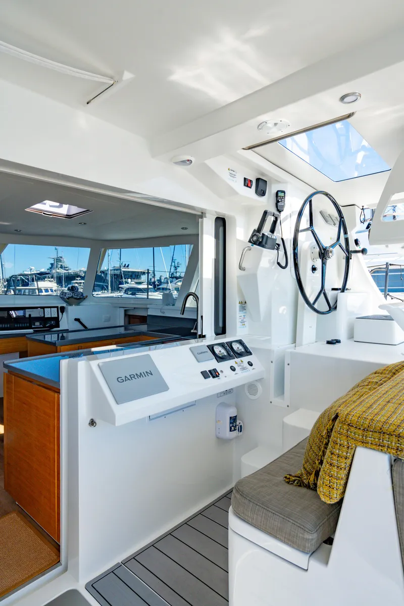 Slide: The Image of Interior of 2022 Balance 442 yacht, featuring modern helm and navigation equipment. - 27