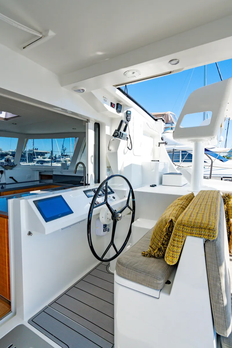 Slide: The Image of 2022 Balance 442 yacht helm with modern controls and seating. - 31
