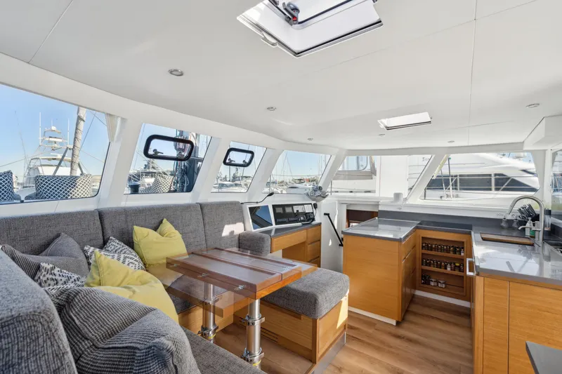 Slide: The Image of Luxurious interior of 2022 Balance 442 yacht with modern seating and kitchen area. - 32