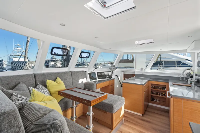 Slide: The Image of Luxurious interior of 2022 Balance 442 yacht with modern seating and kitchen area. - 34