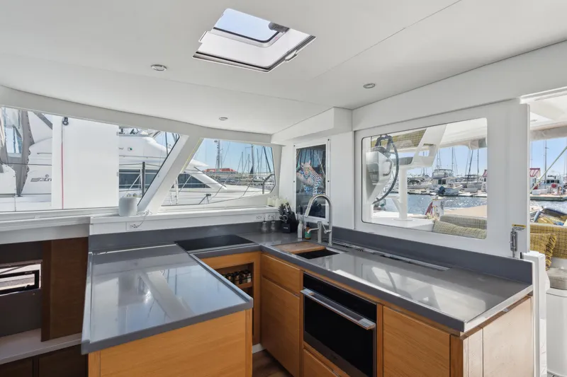 Slide: The Image of Modern kitchen interior on 2022 Balance 442 yacht with marina view. - 38