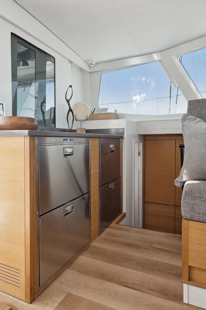 Slide: The Image of Interior of 2022 Balance 442 yacht with modern cabinetry and wooden flooring. - 41