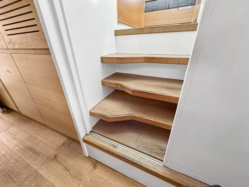Slide: The Image of Wooden staircase in Balance 442 yacht, 2022 model, featuring modern design and sleek finish. - 47