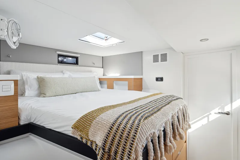 Slide: The Image of Luxurious bedroom interior in 2022 Balance 442 yacht, featuring cozy bedding and modern design. - 48
