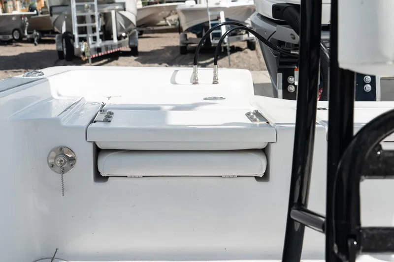 Slide: The Image of 2025 Blazer 2220 Fisherman boat interior with seating and storage. - 15