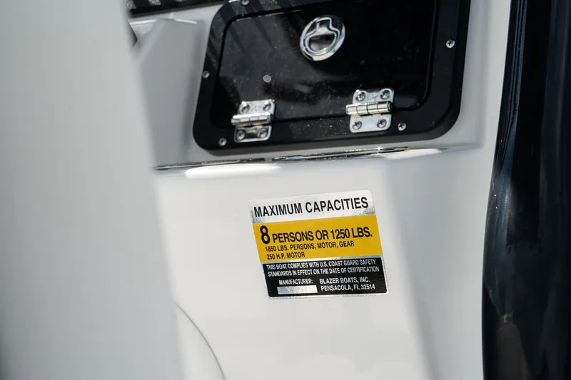 Slide: The Image of 2025 Blazer 2220 Fisherman boat capacity label, 8 persons or 1250 lbs. - 18