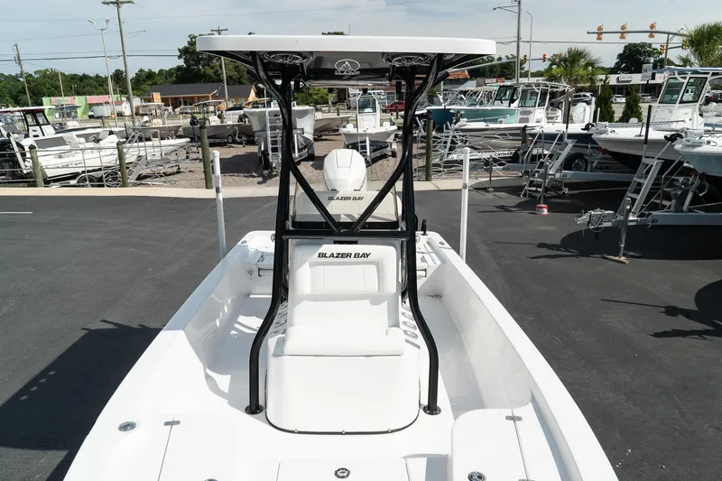 Slide: The Image of 2025 Blazer 2220 Fisherman boat at a marina, front view. - 20