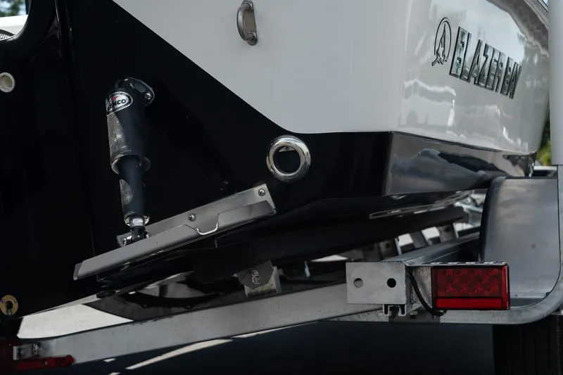 Slide: The Image of 2025 Blazer 2220 Fisherman boat on trailer, rear view. - 7