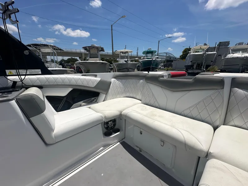 Slide: The Image of 2015 Tigé Z3 boat interior with white leather seating and diamond stitching. - 4