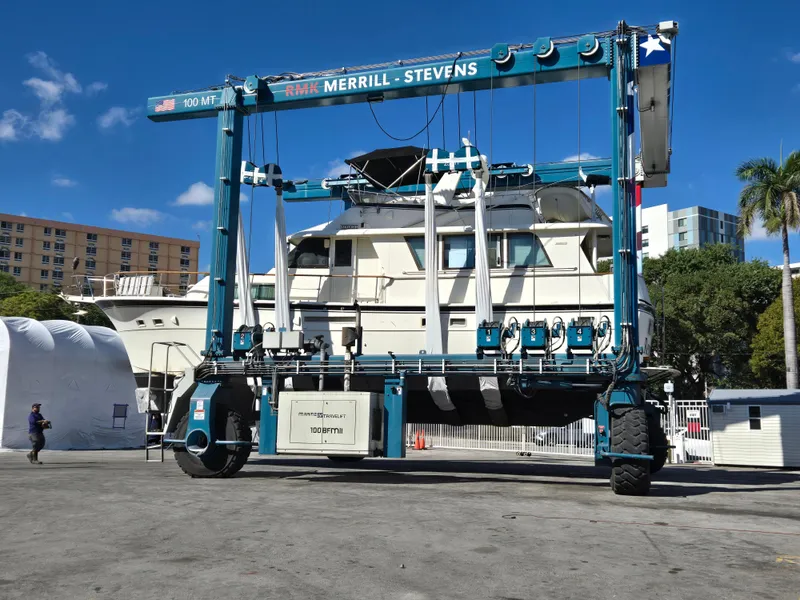 Slide: The Image of 1986 Hatteras 53 Extended Deckhouse yacht on a boat lift at Merrill-Stevens shipyard. - 41